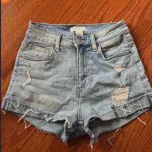 Light wash blue denim shorts